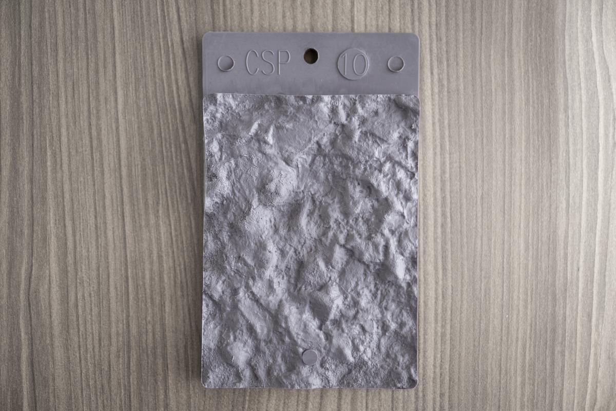 ICRI concrete surface profile chip showing a heavy profile
