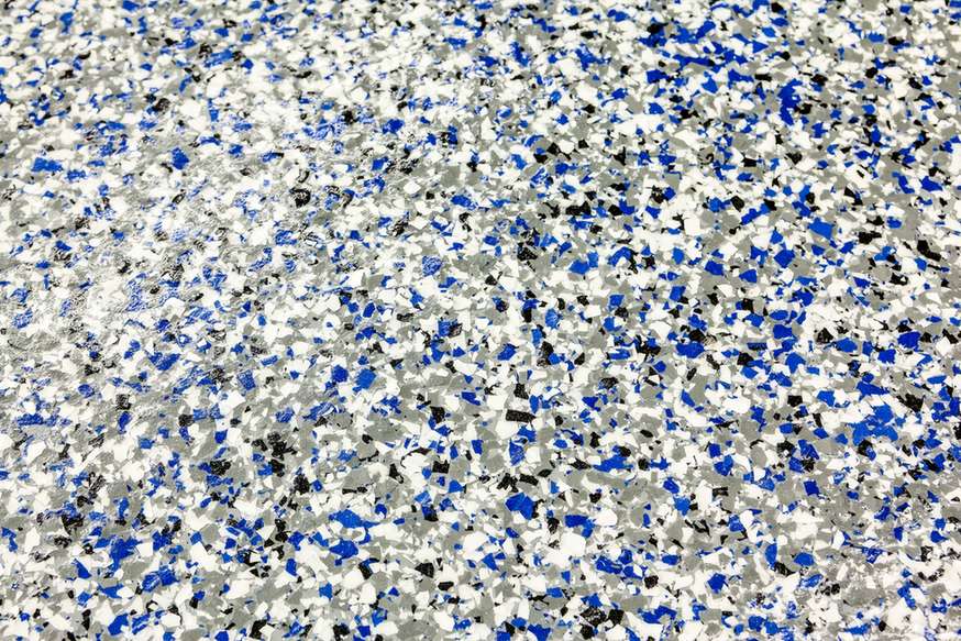 Close-up of blue, gray and white decorative flake