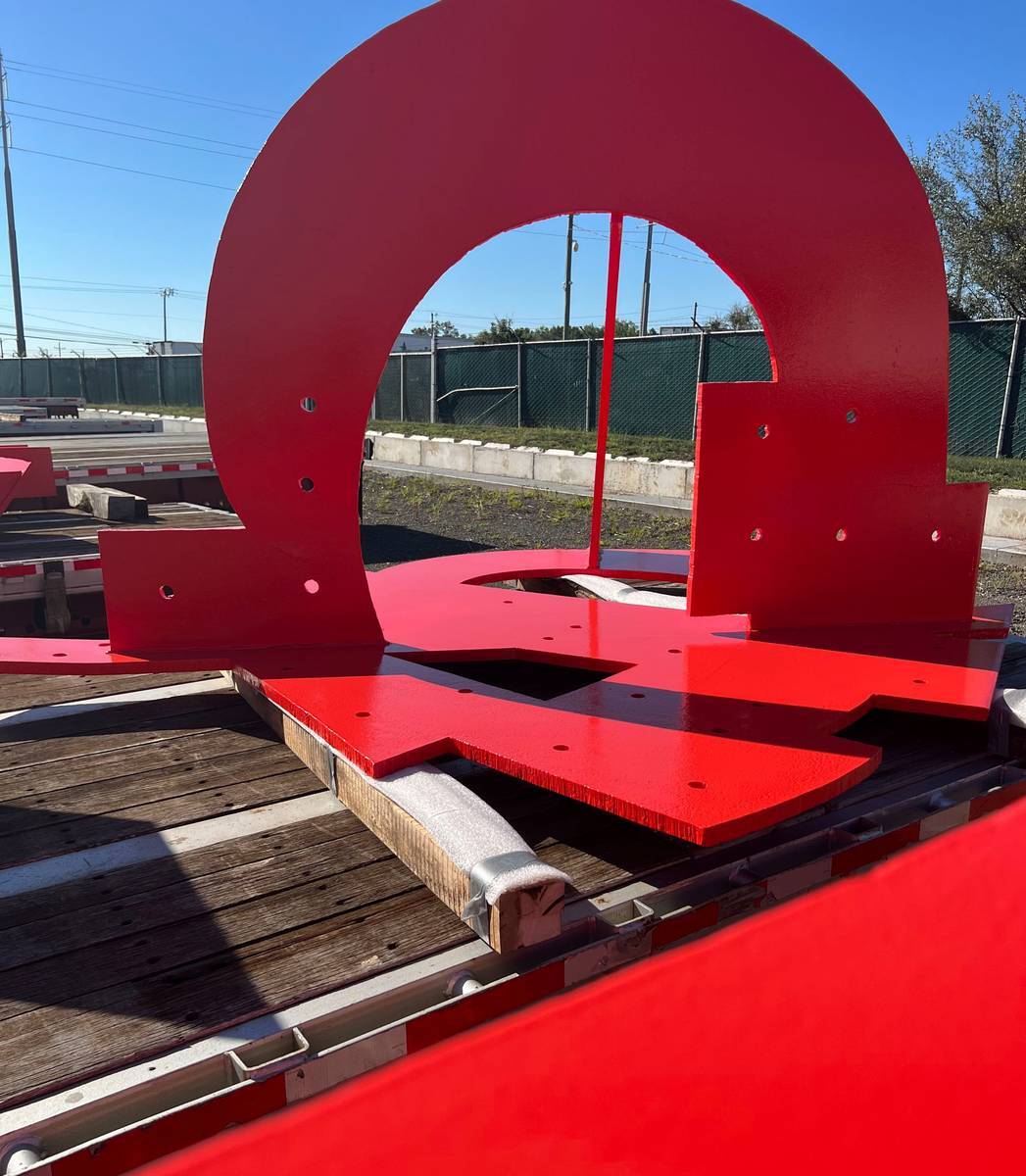 Steel sculpture plates coated in high-gloss red