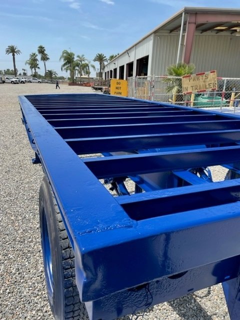 Detail of a coated trailer chassis frame